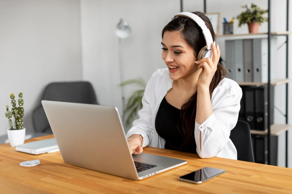 Digital marketing manager tracking SEO traffic and paid ad conversions on a monitor